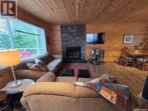 620 Surfside Drive E, Crooked Lake, SK - Indoor Photo Showing Living Room With Fireplace