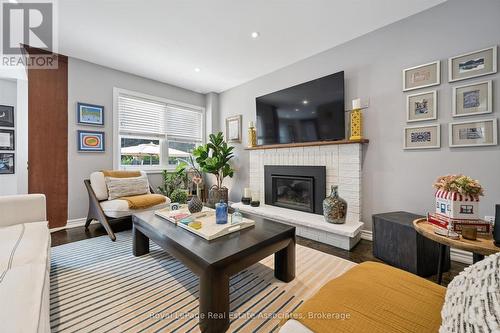 Family Room - 3344 Trelawny Circle, Mississauga, ON - Indoor Photo Showing Living Room With Fireplace