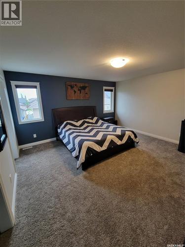 718 Patrick Bay, Saskatoon, SK - Indoor Photo Showing Bedroom