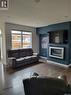 718 Patrick Bay, Saskatoon, SK  - Indoor Photo Showing Living Room 