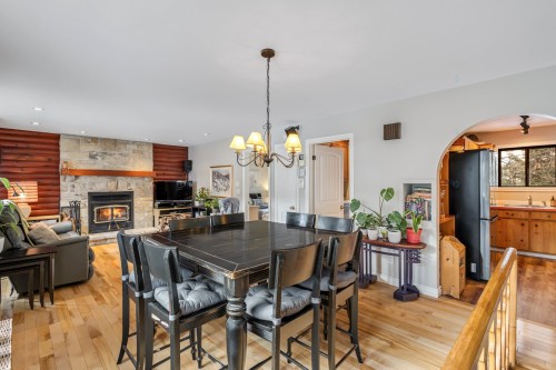 Dining Room - 174 Rue Des Deux-Montagnes, Bromont, QC - Indoor Photo Showing Dining Room With Fireplace