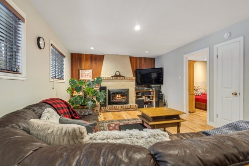 Family Room - 174 Rue Des Deux-Montagnes, Bromont, QC - Indoor Photo Showing Living Room With Fireplace