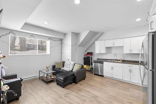 496 Hethrington Ave, Winnipeg, MB - Indoor Photo Showing Kitchen With Double Sink