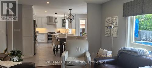 Eatin Kitchen opened to family room - 22 Ashbury Crescent, Caledon, ON - Indoor