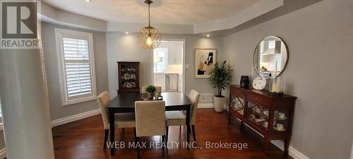 spacious dining room, hardwood,bow window,shutters - 22 Ashbury Crescent, Caledon, ON - Indoor Photo Showing Dining Room