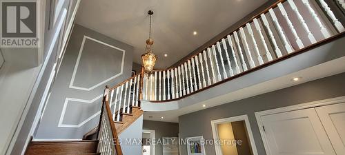 includes light fixture in grand 17 foot foyer - 22 Ashbury Crescent, Caledon, ON - Indoor Photo Showing Other Room