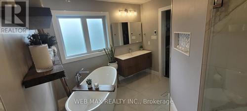 Heated floor ,soaker tub , large window - 22 Ashbury Crescent, Caledon, ON - Indoor Photo Showing Bathroom