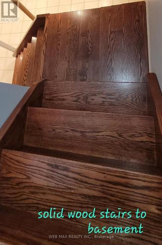 Solid wood  stairs leading to basement - 22 Ashbury Crescent, Caledon, ON - Indoor Photo Showing Other Room