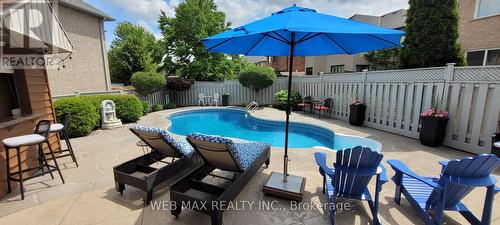 View from kitchen and family room - 22 Ashbury Crescent, Caledon, ON - Outdoor With In Ground Pool With Deck Patio Veranda