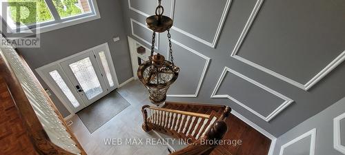 Wainscoting walls,porcelain fl  in 17\"height foyer - 22 Ashbury Crescent, Caledon, ON - Indoor Photo Showing Other Room