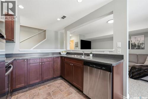 203 515 28Th Street E, Prince Albert, SK - Indoor Photo Showing Kitchen With Double Sink