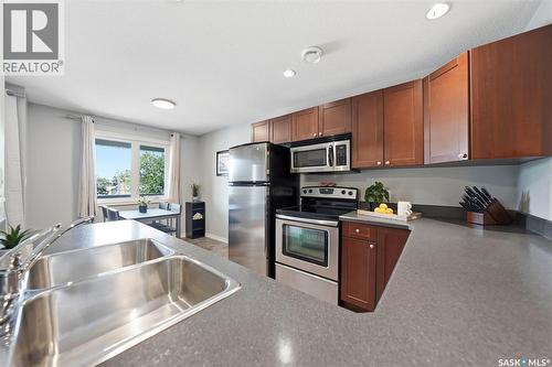 203 515 28Th Street E, Prince Albert, SK - Indoor Photo Showing Kitchen With Stainless Steel Kitchen