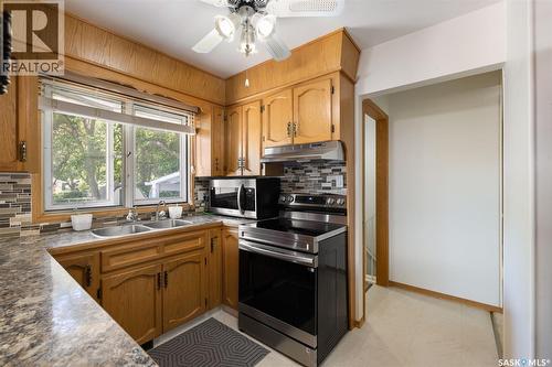 4343 England Road, Regina, SK - Indoor Photo Showing Kitchen With Double Sink