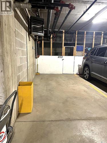 405 600 Centennial Boulevard, Warman, SK - Indoor Photo Showing Garage