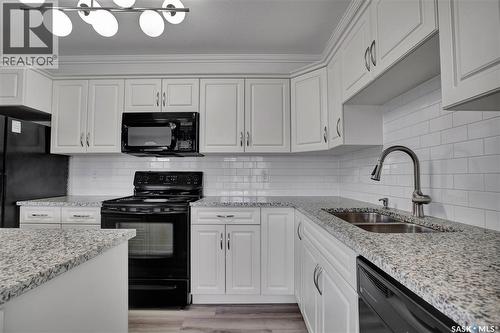 405 600 Centennial Boulevard, Warman, SK - Indoor Photo Showing Kitchen With Double Sink