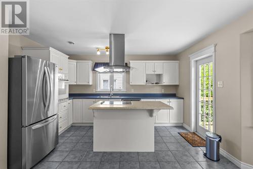Bright eat-in kitchen with upgraded stainless steel appliances in 2019 & abundant cabinetry and workspace. - 21 Westbrook Landing, Mount Pearl, NL - Indoor Photo Showing Kitchen