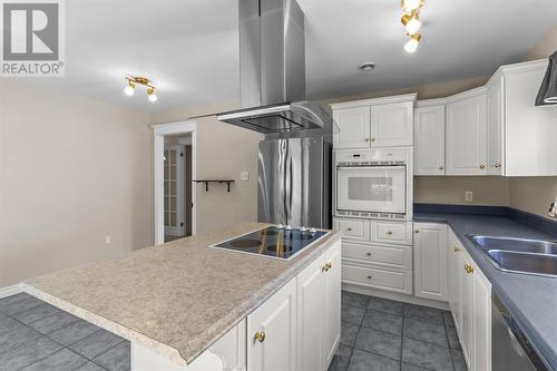 Open concept kitchen designed for everyday family living & entertaining. - 21 Westbrook Landing, Mount Pearl, NL - Indoor Photo Showing Kitchen With Double Sink