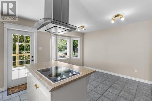 Excellent workspace with plenty of cabinets and prep space. - 21 Westbrook Landing, Mount Pearl, NL - Indoor Photo Showing Kitchen