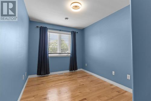 Bright secondary bedroom with hardwood flooring. - 21 Westbrook Landing, Mount Pearl, NL - Indoor Photo Showing Other Room