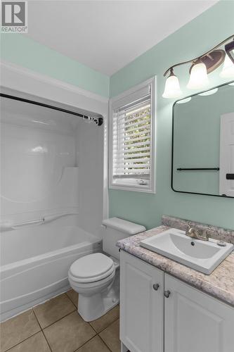 Bright primary bedroom ensuite with updated fixtures and plenty of natural light. - 21 Westbrook Landing, Mount Pearl, NL - Indoor Photo Showing Bathroom