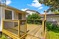 Spacious rear deck ideal for relaxing and outdoor entertaining. - 