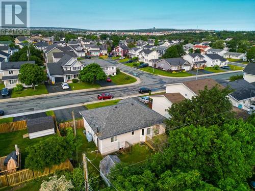 Rear aerial showing the backyard, deck, storage shed, and surrounding community. - 21 Westbrook Landing, Mount Pearl, NL - Outdoor With View