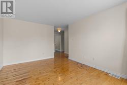 Bright open living area perfect for everyday living and entertaining. - 