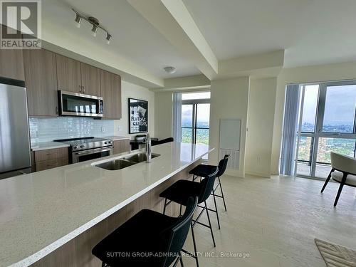 Ph102 - 38 Annie Craig Drive, Toronto, ON - Indoor Photo Showing Kitchen With Double Sink With Upgraded Kitchen