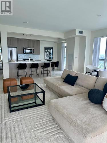 Ph102 - 38 Annie Craig Drive, Toronto, ON - Indoor Photo Showing Living Room