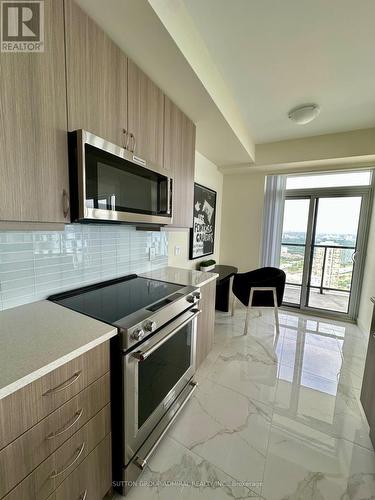 Ph102 - 38 Annie Craig Drive, Toronto, ON - Indoor Photo Showing Kitchen