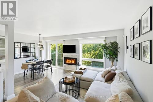12 - 39 Panabaker Drive, Hamilton, ON - Indoor Photo Showing Living Room With Fireplace