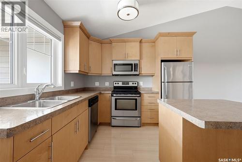 4203 Green Apple Drive E, Regina, SK - Indoor Photo Showing Kitchen With Stainless Steel Kitchen With Double Sink