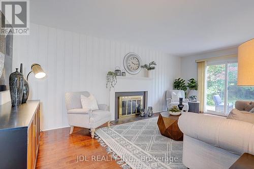 20 Mossgrove Trail, Toronto, ON - Indoor Photo Showing Living Room With Fireplace
