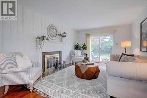 20 Mossgrove Trail, Toronto, ON - Indoor Photo Showing Living Room With Fireplace