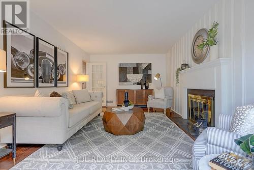 20 Mossgrove Trail, Toronto, ON - Indoor Photo Showing Living Room With Fireplace