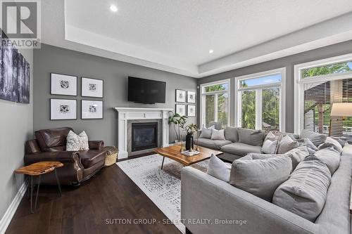 14 Mayapple Crescent, Middlesex Centre (Ilderton), ON - Indoor Photo Showing Living Room With Fireplace