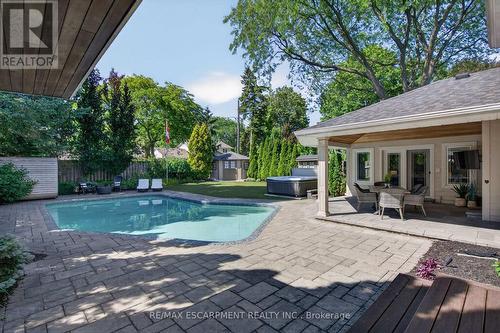 Soak it all in - 4461 Tremineer Avenue, Burlington, ON - Outdoor With In Ground Pool With Deck Patio Veranda