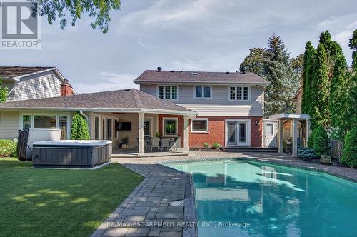 Plus a hot tub - 4461 Tremineer Avenue, Burlington, ON - Outdoor With In Ground Pool With Deck Patio Veranda