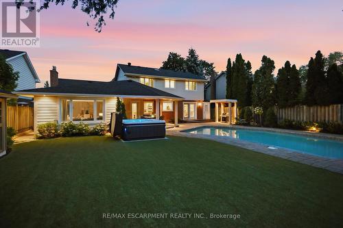 All turf, No grass - 4461 Tremineer Avenue, Burlington, ON - Outdoor With In Ground Pool With Deck Patio Veranda