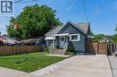 Blue siding exterior with a pitched roof - 621 Tate Avenue, Hamilton, ON  - Outdoor 