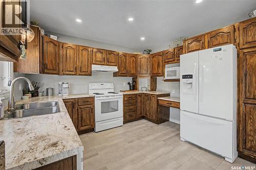 1791 Barton Drive, Prince Albert, SK - Indoor Photo Showing Kitchen With Double Sink