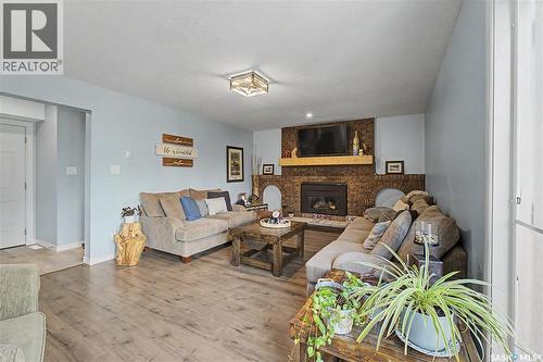 1791 Barton Drive, Prince Albert, SK - Indoor Photo Showing Living Room With Fireplace