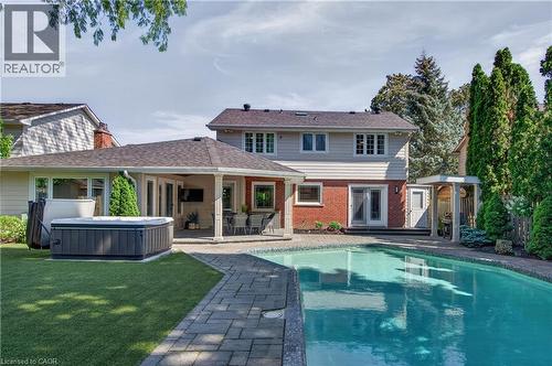 Hot tub too - 4461 Tremineer Avenue, Burlington, ON - Outdoor With In Ground Pool With Deck Patio Veranda