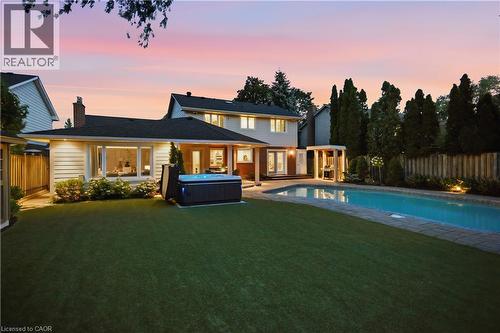 All turf, no grass! - 4461 Tremineer Avenue, Burlington, ON - Outdoor With In Ground Pool With Deck Patio Veranda