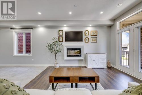 486 Silver Maple Road, Oakville, ON - Indoor Photo Showing Living Room With Fireplace