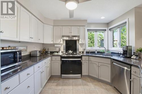 9989 Oxbow Drive, Middlesex Centre (Komoka), ON - Indoor Photo Showing Kitchen