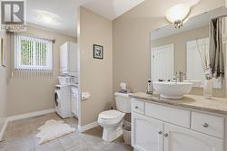 main floor powder room & laundry - 