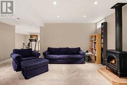 Lower Level Family room with gas fireplace - 