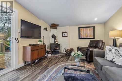 11024 First Line Nassagaweya, Milton (Moffat), ON - Indoor Photo Showing Living Room With Fireplace