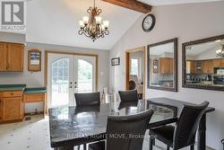 Dining area has a W/O to the deck & pool. - 